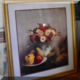 A26. Framed floral still life print.